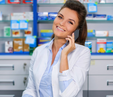 pharmacist talking someone on the phone